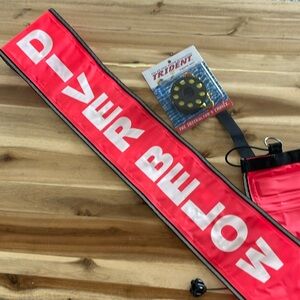 Trident Diving Gear Accessories: 45' line and 6' orange dive sign.